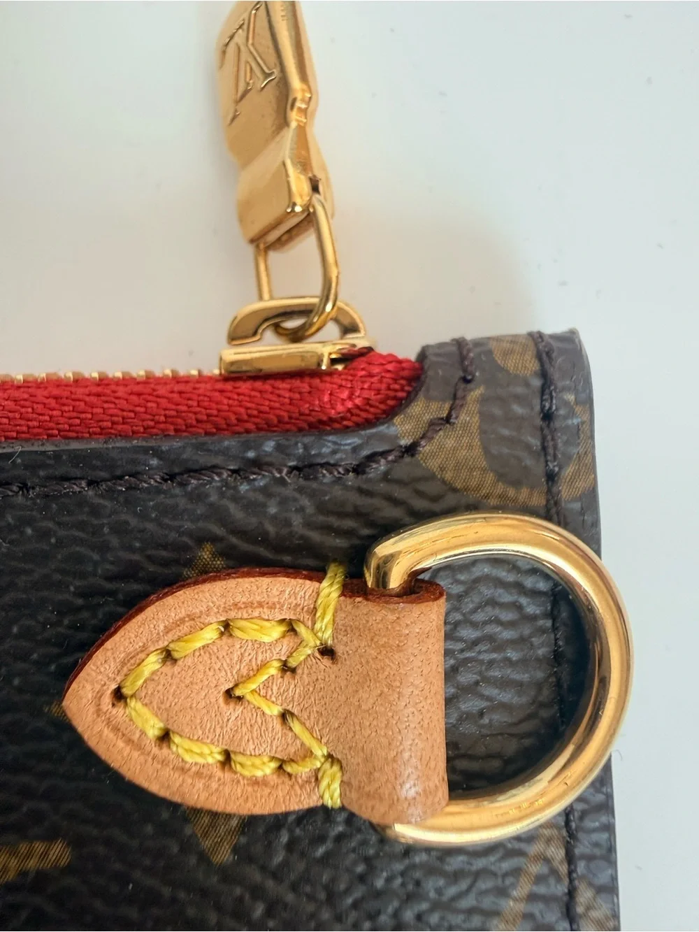 Louis Vuitton Monogram Neverfull Pouch in Brown with Red Trim and Red Interior